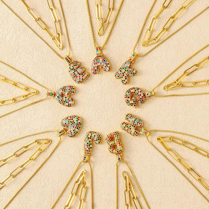 Set di 2 collane con iniziali a bolla