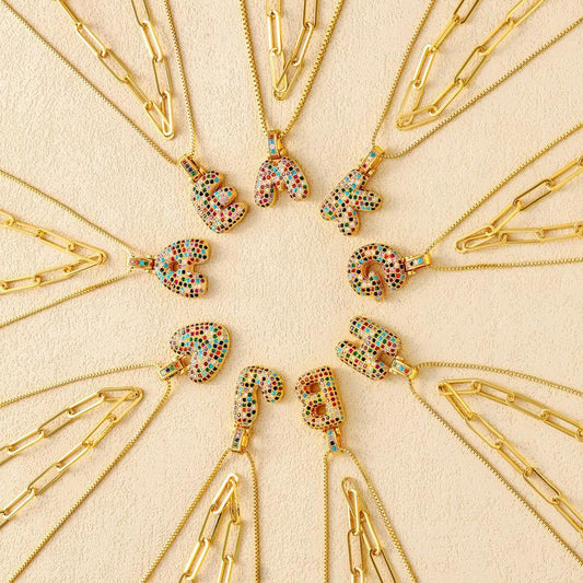 Set di 2 collane con iniziali a bolla