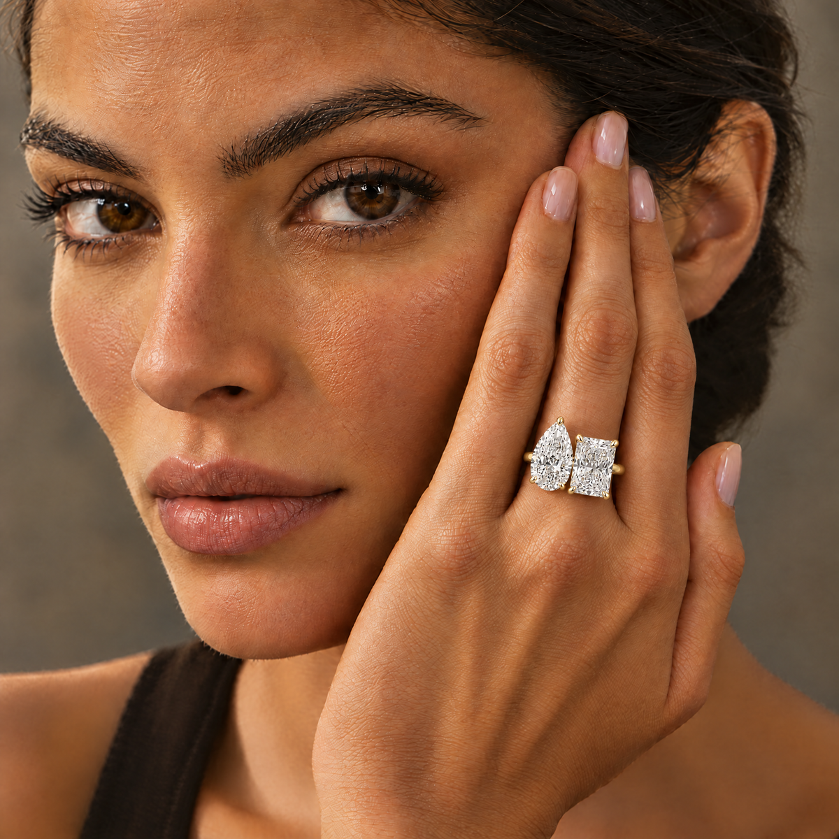 Model wearing the Toi et Moi Pear & Radiant Ring