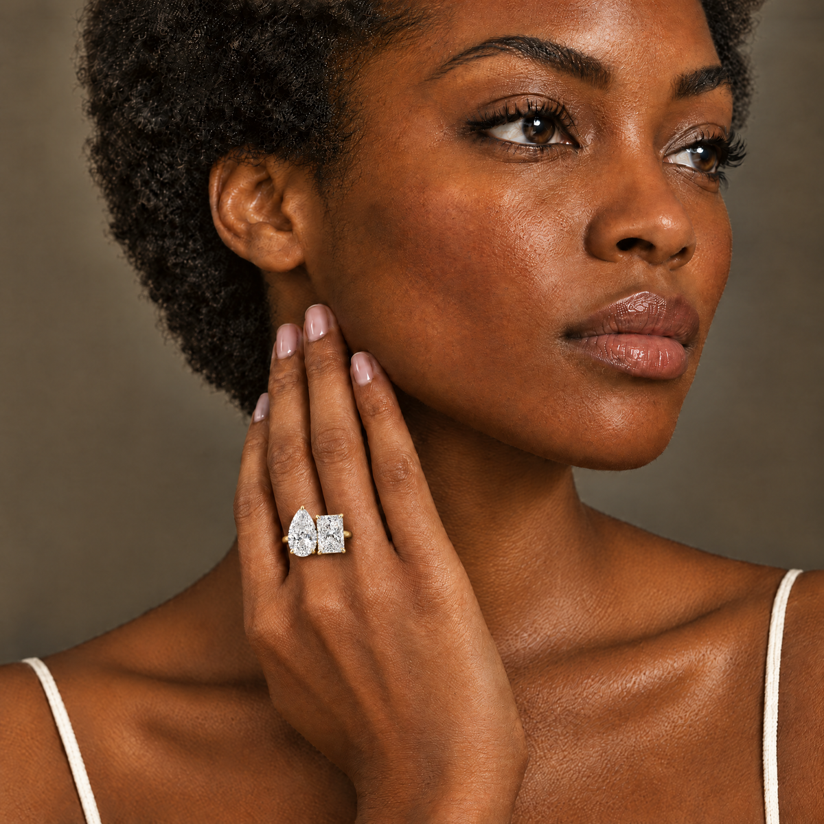 Model wearing the Toi et Moi Pear & Radiant Ring