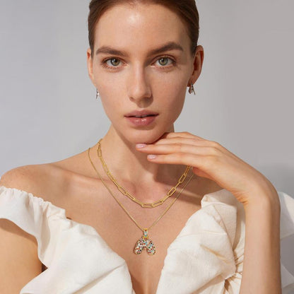 Set di 2 collane con iniziali a bolla