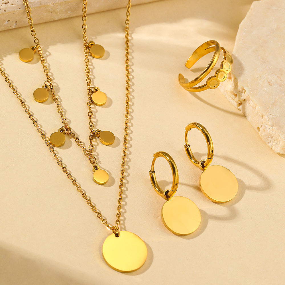 Set di gioielli con ciondoli a disco in oro, 4 pezzi