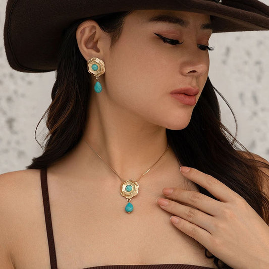 Set di gioielli con girocollo con fiore in pietra blu