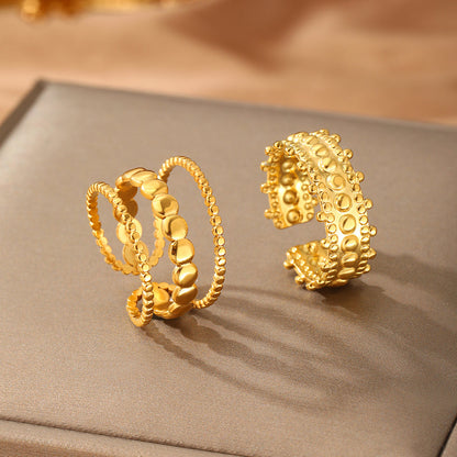 Set di 3 anelli con perline dorate