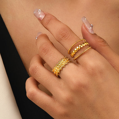 Set di 3 anelli con perline dorate