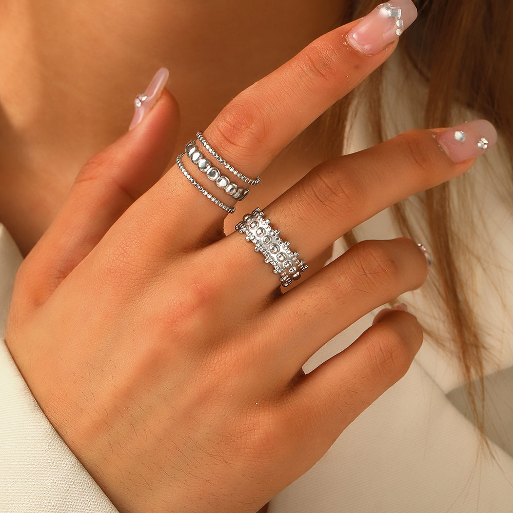 Set di 3 anelli con perline dorate