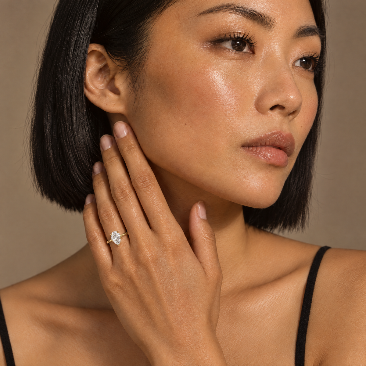 Model wearing the Pear Solitaire Ring