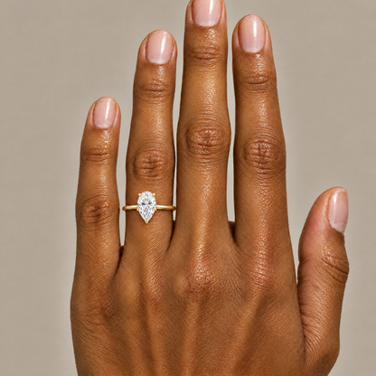 Pear Solitaire Ring worn on the hand