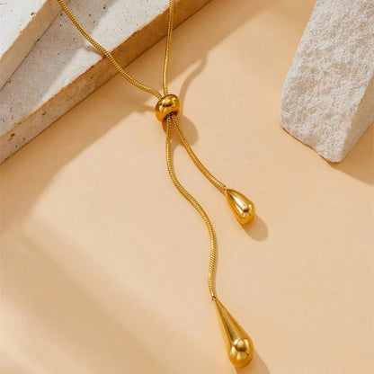 Set di 3 collane e orecchini pendenti geometrici