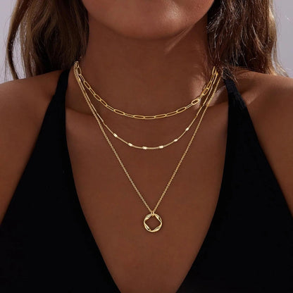 Set di 3 collane geometriche in oro 14k