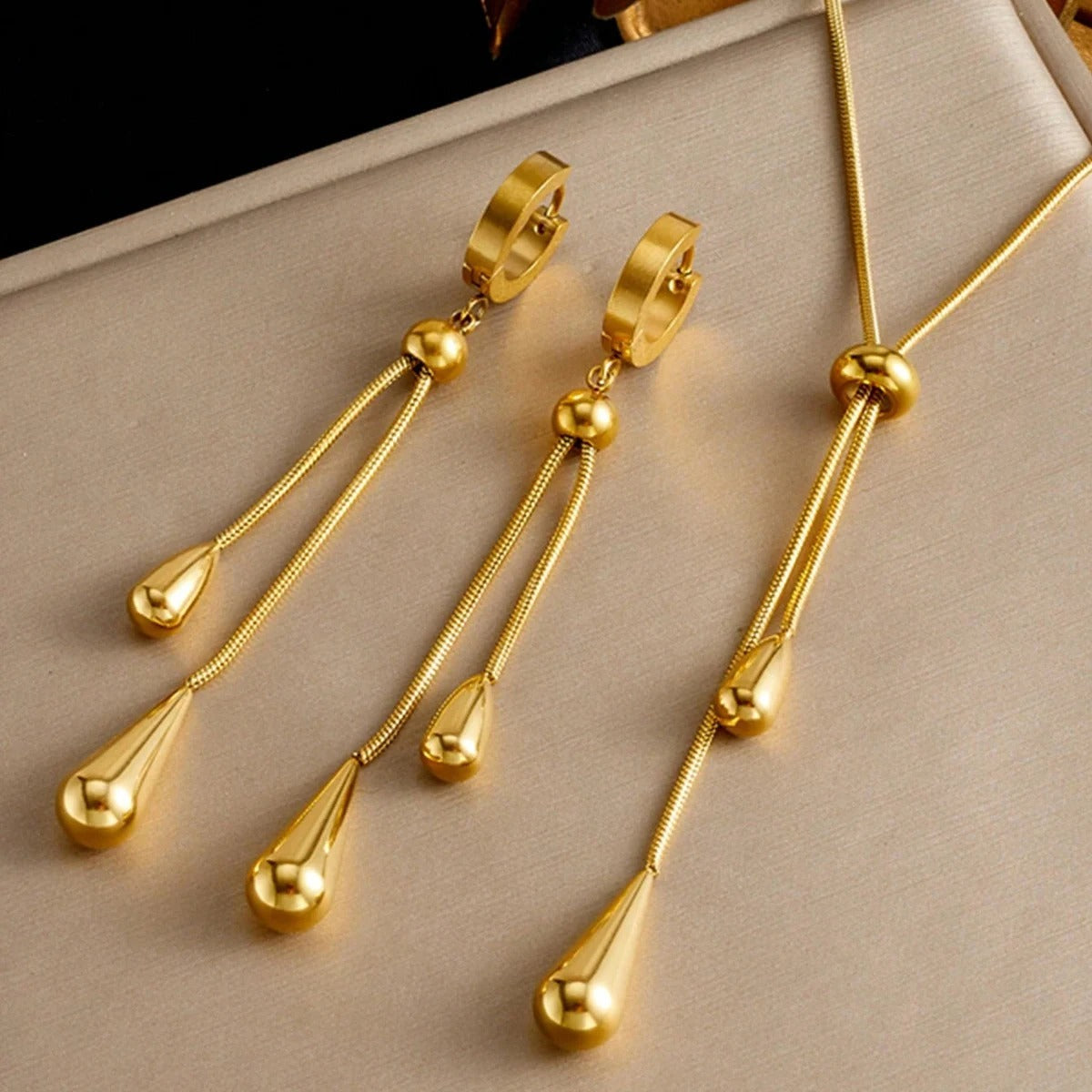 Set di 3 collane e orecchini pendenti geometrici