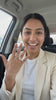 Woman showing the Toi et Moi Pear & Radiant Ring